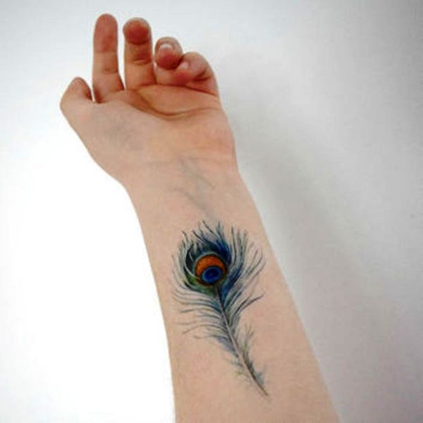Cool Peacock Feather Wrist Tattoo