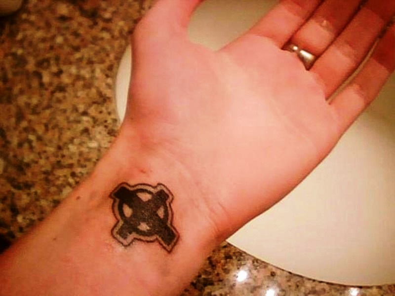 Cross Tattoo On Wrist With Lovely Design