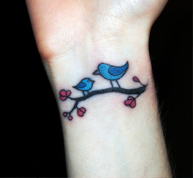 Cute Blue Bird Tattoo On Wrist