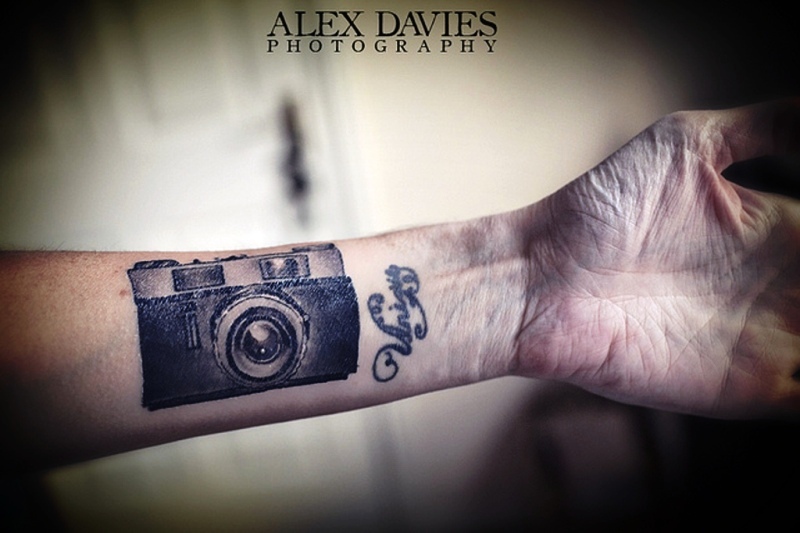 Cute Camera Wrist Tattoo Design