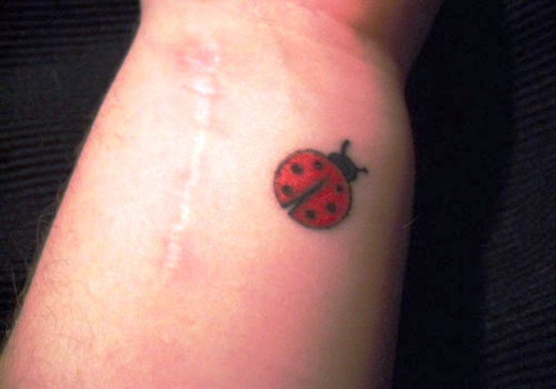 Cute Ladybug Tattoo On Wrist