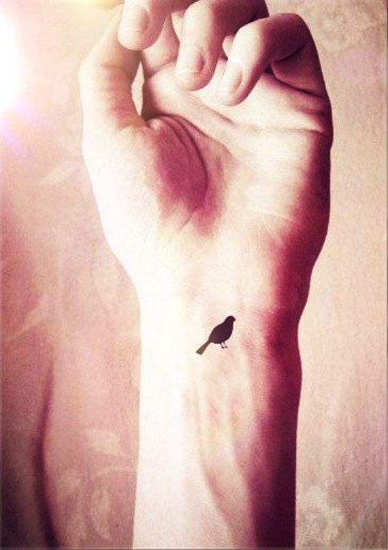 Cute Solo Bird Tattoo On Wrist