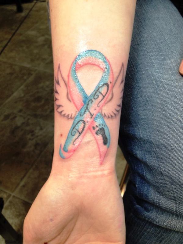 DTD Cancer Ribbon Tattoo On Wrist