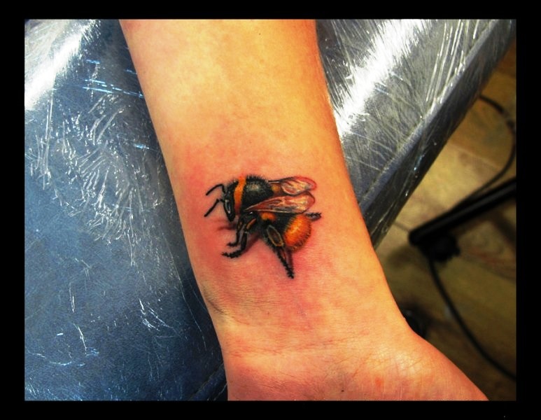 Dazzling Bee Tattoo On Wrist