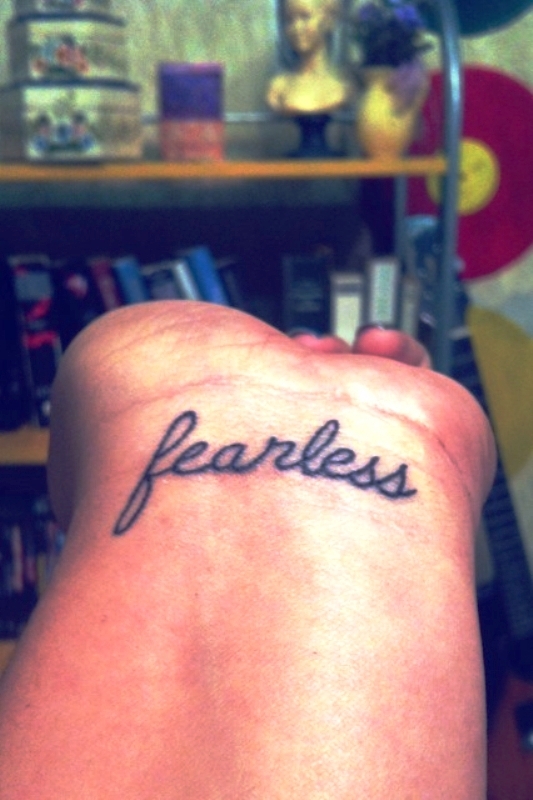 Elegant Fearless Wrist Tattoo