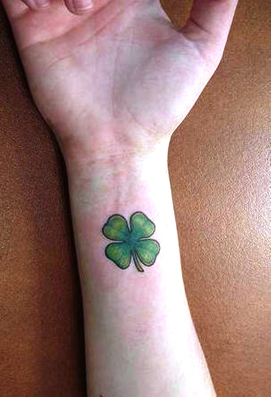 Elegant Four Leaf Tattoo On Wrist