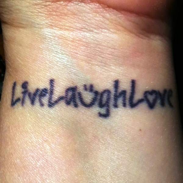 Elegant Live Laugh Tattoo On Wrist