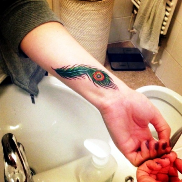 Elegant Peacock Feather Wrist
