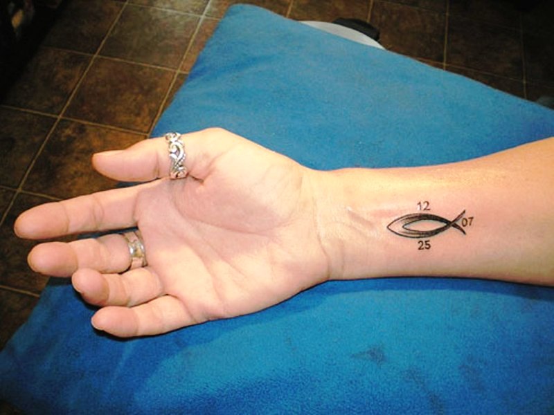 Elegant Fish Tattoo On Wrist