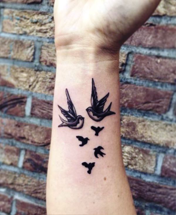 Fantastic Flying Birds Tattoo On Wrist