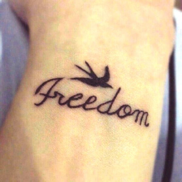 Freedom With Bird Tattoo On Wrist