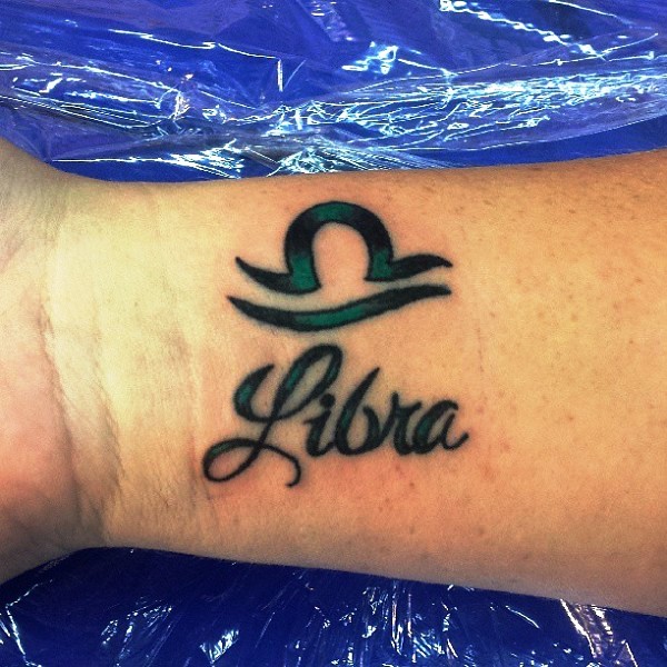 Green Libra Wrist Tattoo