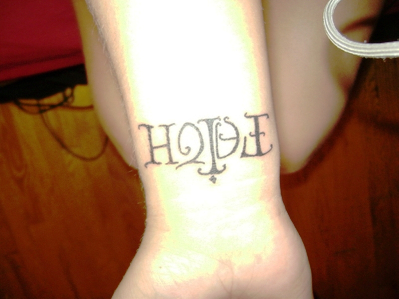 Hope Design Tattoo On Wrist