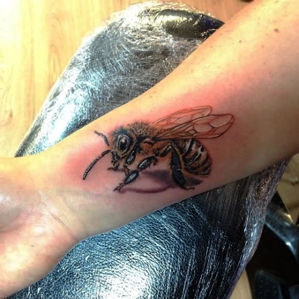 Huge Bee Tattoo On Wrist