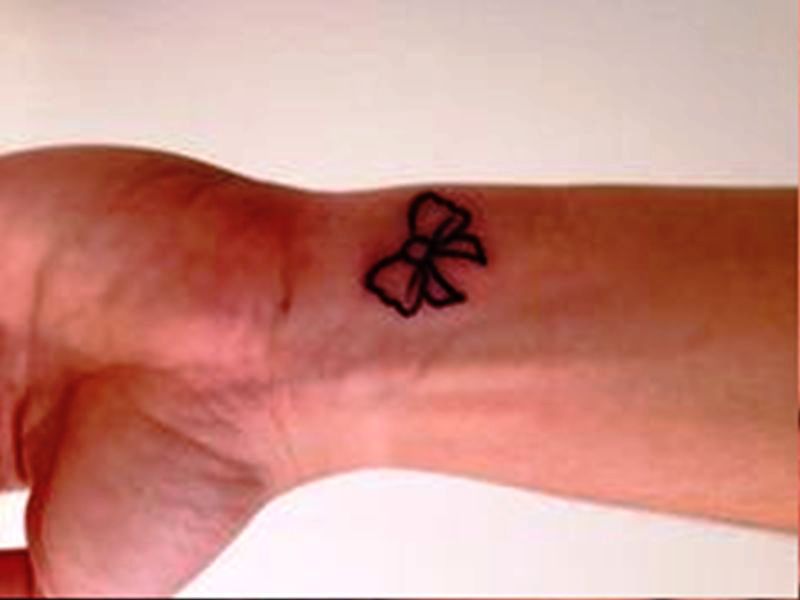 Image Of Bow Tattoo On Wrist
