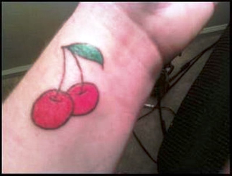 Large Cherry Tattoo On Wrist