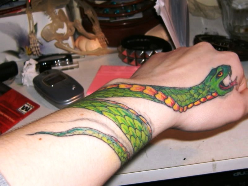 Large Green Snake Wrist Tattoo