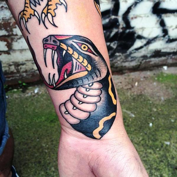 Large Snake Wrist Tattoo
