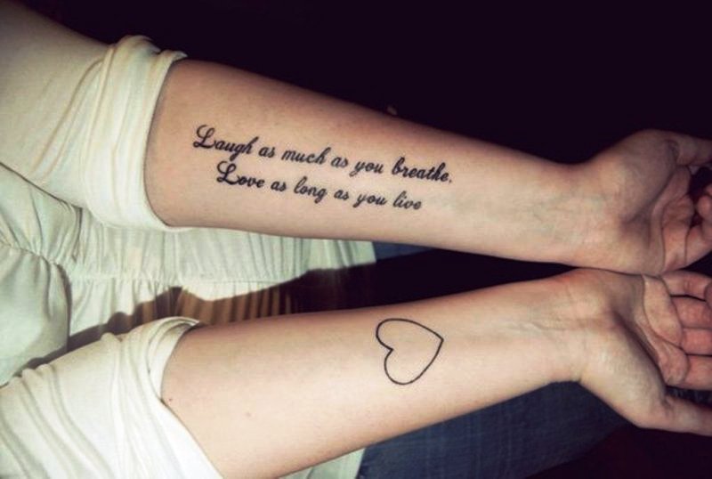 Laugh And Love Quote Tattoo On Wrist