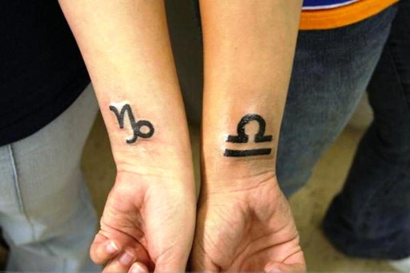 Libra Zodiac And Capricorn Tattoos On Wrist