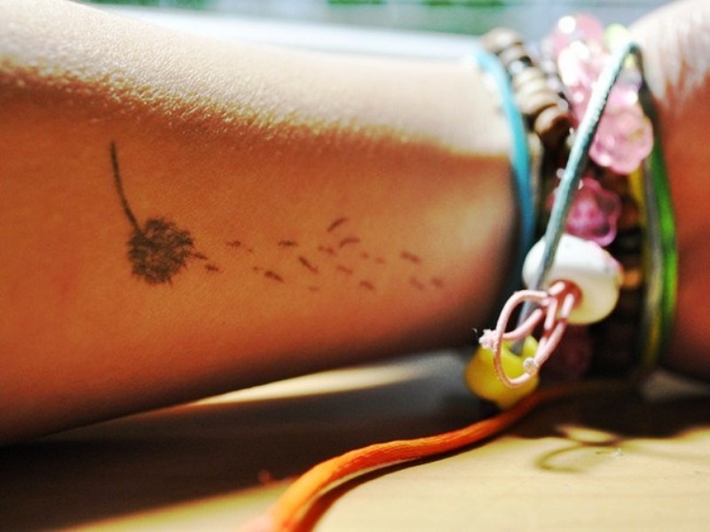 Light Colored Dandelion Tattoo On Wrist