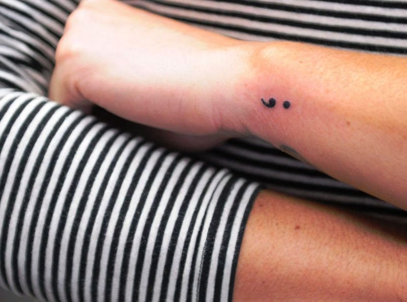 Little Black Tattoo On Wrist