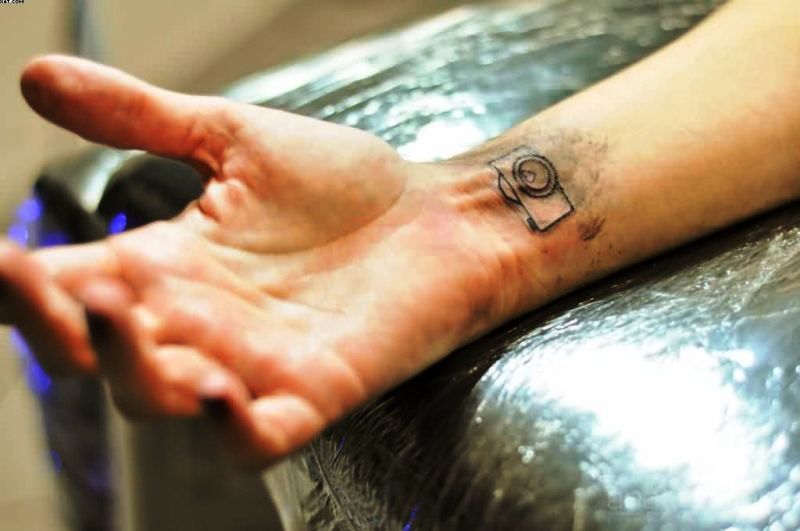 Little Camera Tattoo On Wrist