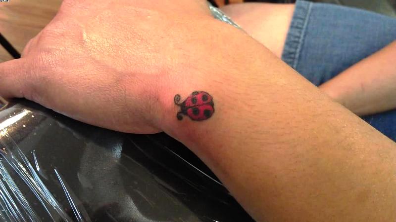 Little Red Ladybug Tattoo On Wrist