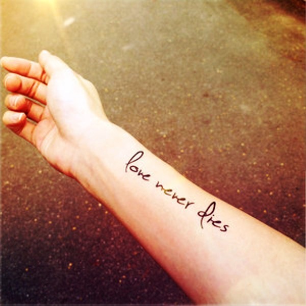 Love Never Dies Tattoo On Wrist