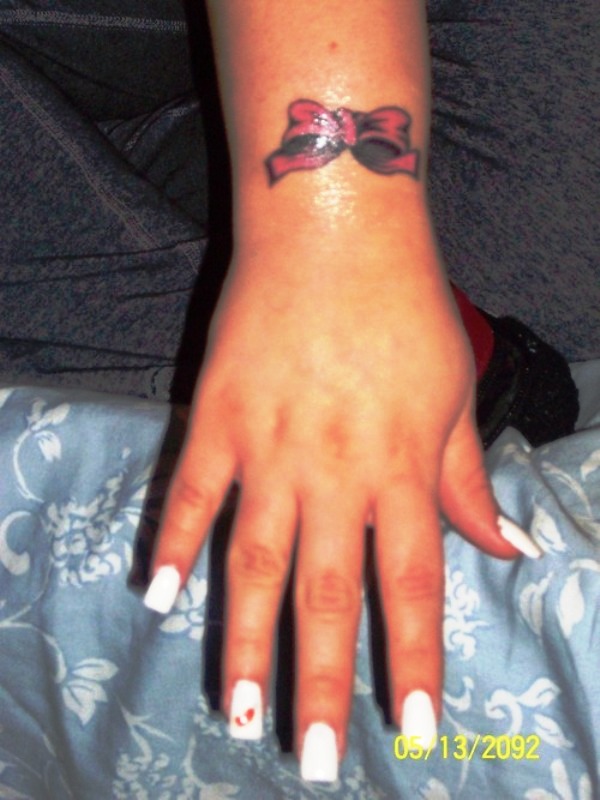 Lovely Bow Tattoo On Wrist
