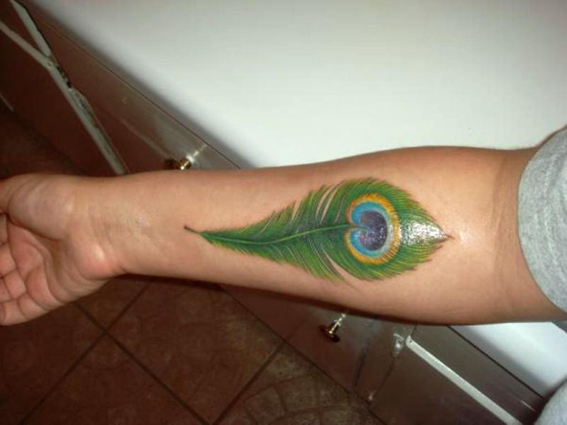 Lovely Peacock Feather Wrist Tattoo
