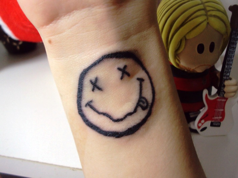Lovely Smile Wrist Tattoo