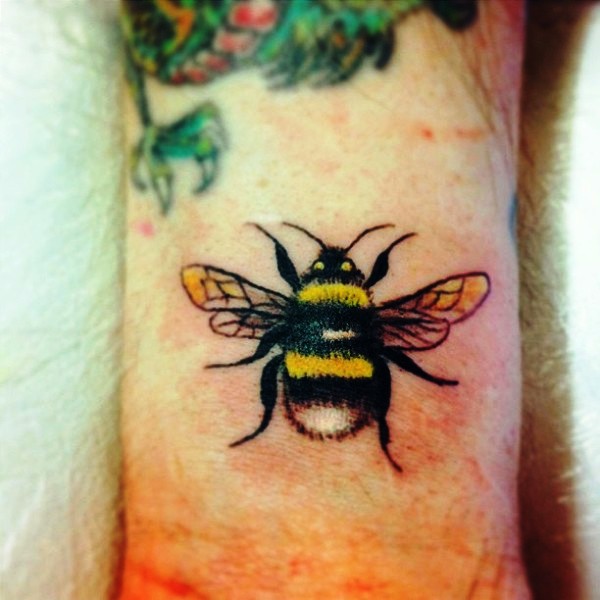 Marvelous Yellow Bee Tattoo On Wrist