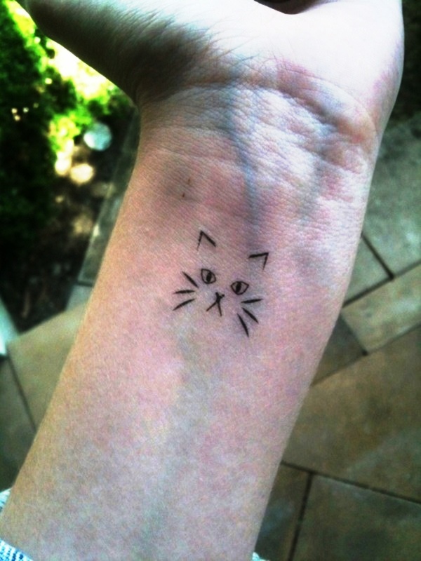 Minimalist Tattoo On Wrist