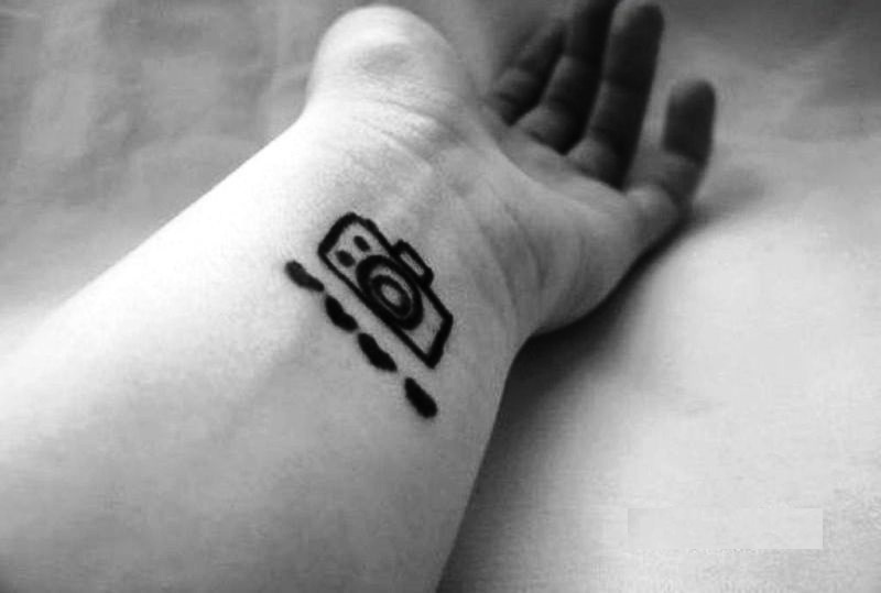 Nice Black And White Camera Wrist Tattoo