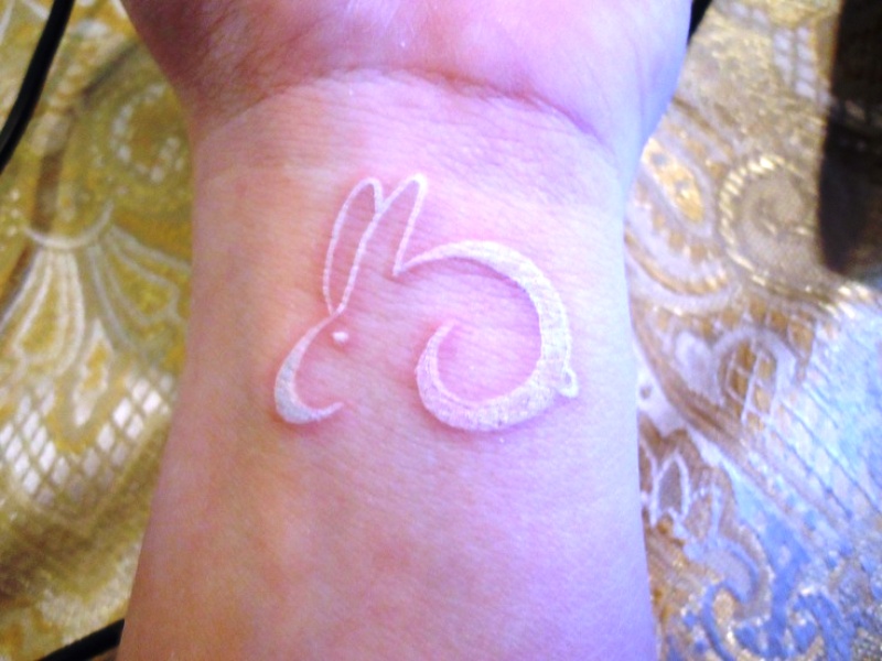 Nice White Rabbit Tattoo On Wrist