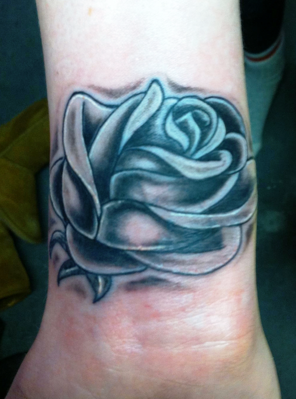 Outstanding Blue Rose Tattoo On Wrist