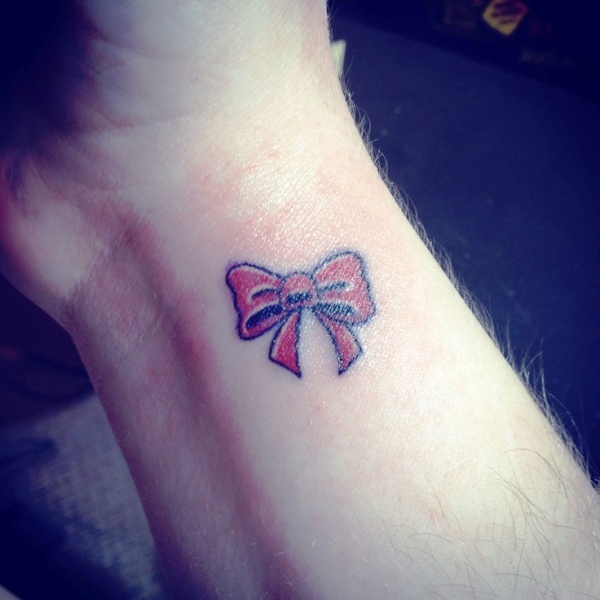 Outstanding Bow Tattoo On Wrist