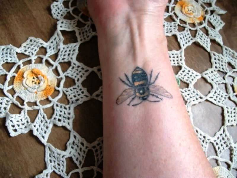 Photo Of Bee Tattoo On Wrist