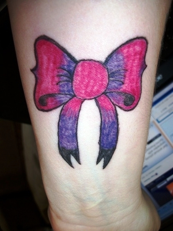 Pink And Blue Tattoo On Wrist