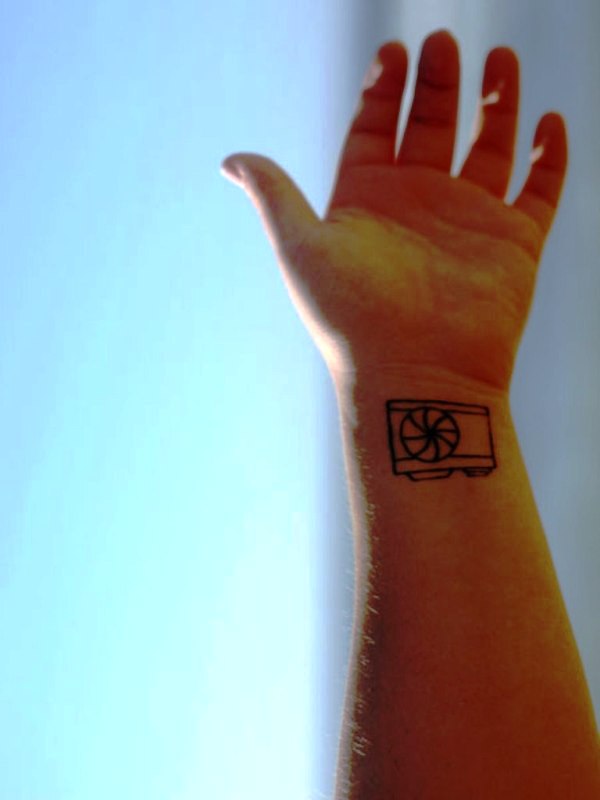 Pocket Camera Wrist Tattoo