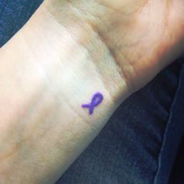 Purple Cancer Ribbon Tattoo On Wrist