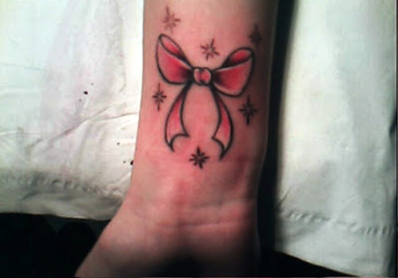 Red Bow With Stars Tattoos Design
