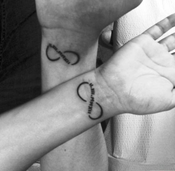 Roman Infinity Tattoos On Both Wrist