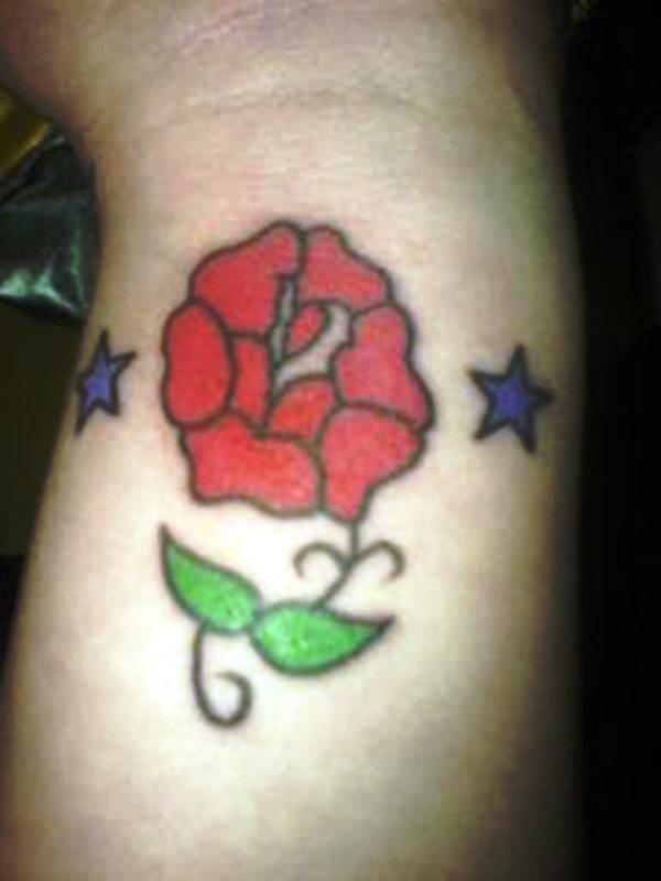 Rose And Star Tattoo On Wrist