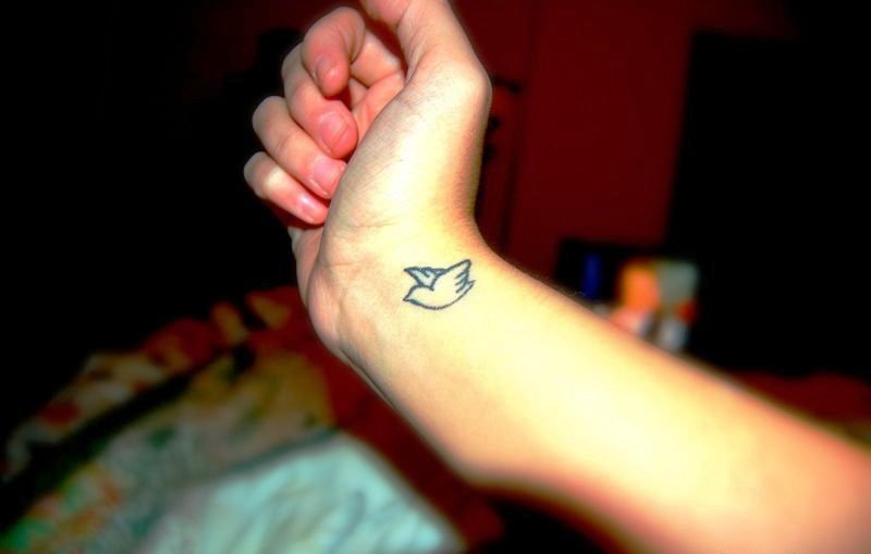 Simple And Cute Bird Tattoo