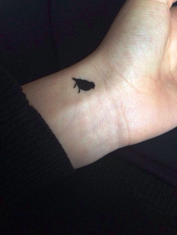 Small Blacked Ink Tattoo