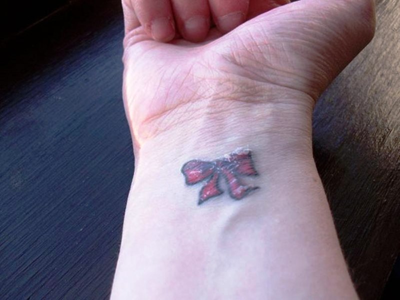 Small Ribbon Wrist Tattoo