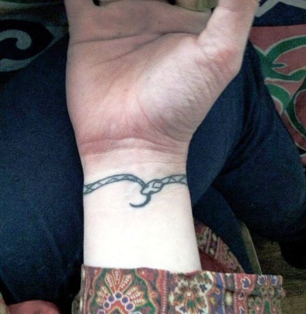 Small Snake Tattoo On Wrist
