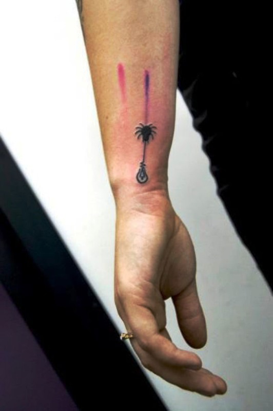 Small Spider Wrist Tattoo